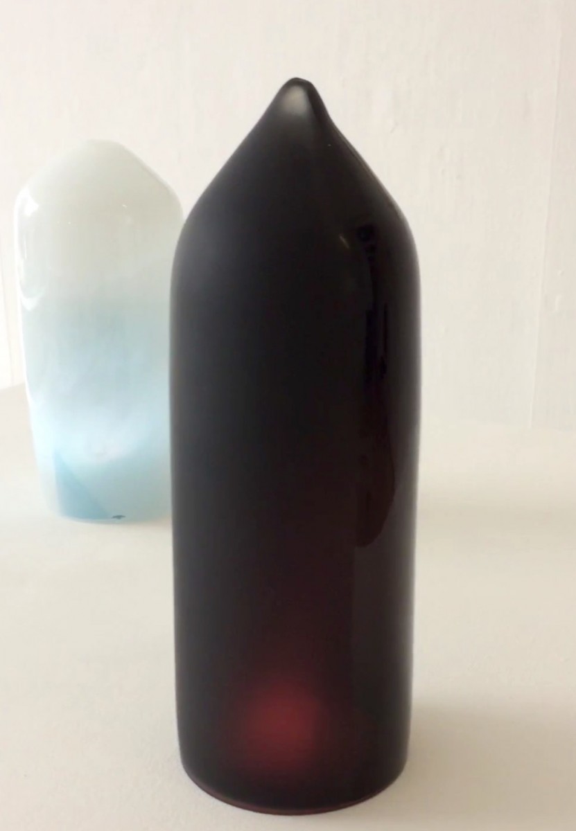 Blach and white glass pods with inner lights