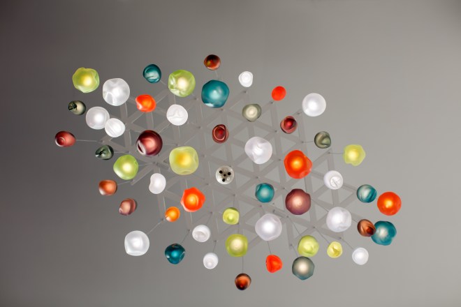 View from below of multi-coloured glass chandelier